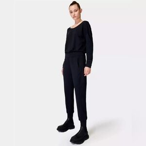 New Sweaty Betty Jumpsuit Black Garry Womens Size Large Long Sleeve Yoga Lounge
